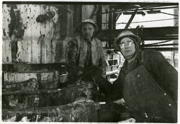 Two Unidentified Phillips Petroleum Co. Employees.