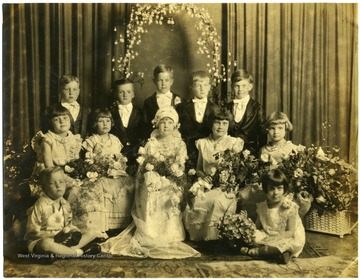 Thelma Cain is the Second from the right; she is sitting on the floor.