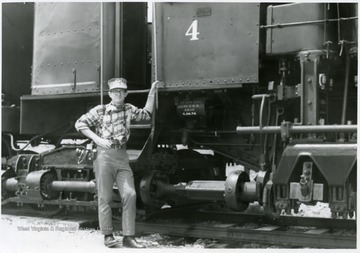 Augie Mastroguiseppe standing next to Shay No. 4 at Cass Scenic Railroad.