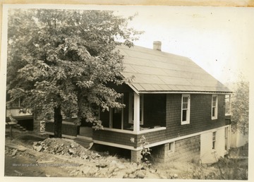 Monongalia County Building and Loan Association. District: Riverside; From whom acquired Wade, Elizabeth, #1; Address of property: Ohio Avenue, Riverside; Description: Lot 1, Pt. 2 Block 37.5 x 100'; Improvements: dwelling, five rooms and bath, frame construction, composition roof, basement, furnace.