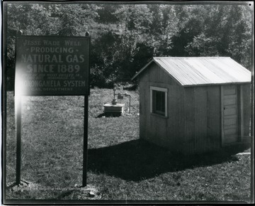 Jesse Wade Gas Well. Producing natural gas since 1889. First of the 350 gas wells drilled in Cass District, Monongalia County. Monongahela System Gas Department.