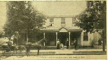 'A study in graciousness is presented by the photo of the residence of Grove Chadwick on High St. Note the trees which were the street's crowning glory before street widening programs.' 