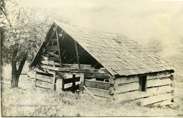 The building, much disfigured by time and abuse, in which Alexander L. Wade taught his first school.