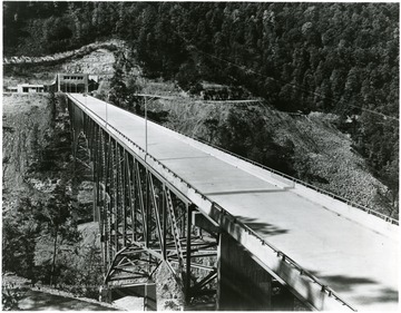The Bender Bridge at the southern entrance of the tunnel towers 278 feet above the bottom of the gorge, and was dedicated to Staff Sergeant Stanley Bender, a Congressional Medal of Honor Winner.  (Kanawha County)
