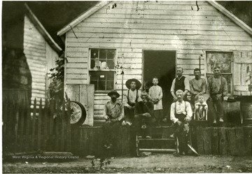 'Mrs. Chester Hunter's Father.'  Left to Right: Charles Beatty (sitting by Hattie), Hattie Dickinson (Charles Dickinson's younger sister marriet Fred Hastings), Isaack Bowers, John Jenkens, Charlie Goodwin (?).