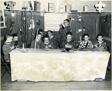 Pictured second from left is Pat Ryan, third from left is Bill Hall, fourth from left is David Smith, fifth from left is Darryl Nabors, standing is Charles Armistead, and seated in front of him is Burt Spencer.  Troop 50 was from the Spruce Street Methodist Church.