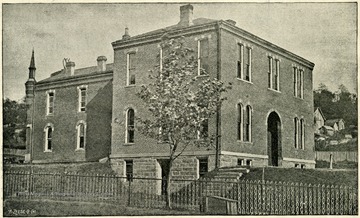'WVU Agricultural Experiment Station before remodeling originally built to be used as Armory enlarged for use as Experiment Station in 1888.'