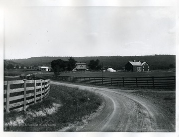 Distant view of a farmhouse in Patterson Creek, West Virginia.