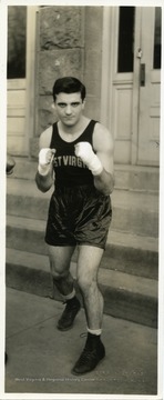 Portrait of an unidentified member of the West Virginia University Boxing Team.