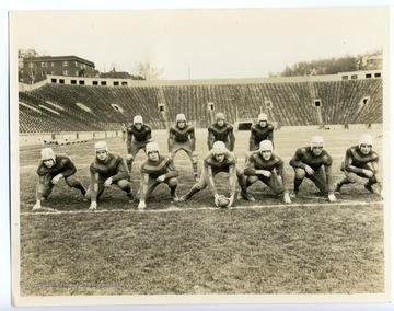 Group portrait of the 1930 WVU football team's offense.  Photograph in the 1931 Monticola.