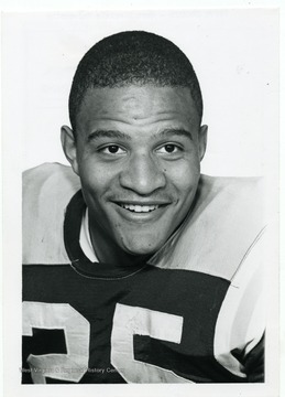 Portrait of Steve Edwards, a member of the West Virginia University Football Team. 'Taylor Publishing Company, Job Number 07206, Picture 3, Page Number 220. West Virginia University, Morgantown, West Virginia.'