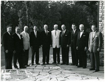 'From left to right:  1. Forest H. Kirkpatrick, 2. Raymond E. Salvati, 3. Thomas L. Harris, 4. President Elvis J. Stahr, 5. E.G. Otey, 6. A.C. Spurr, 7. Douglas K. Bowers, 8. Frank J. Zsoldos, 9. William G. Thompson, 10. James H. Swadley.'