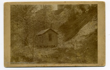 'Hick House in ravine below Woodburn Hall on Falling Run, where cadavers were kept for West Virginia University Medical School.'