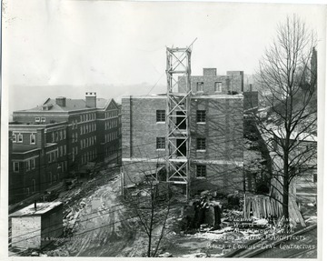 Construction of Dadisman Hall, West Virginia University. 'Women's Hall Annex, West Virginia University, January 05, 1942, Morgantown, West Virginia. Tucker &amp; Silling Architects, Baker &amp; Coombs, General Contractors.'