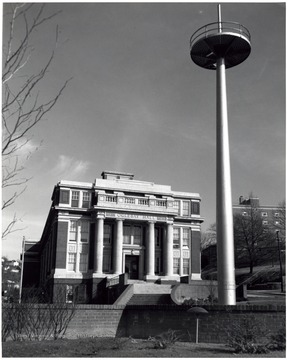 The mast arrived on campus in 1961 and dedicated in 1963.