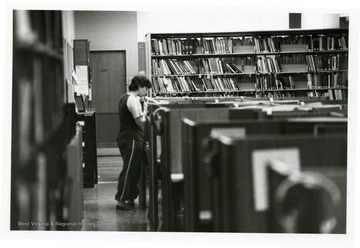 Students are studying in the Medical Center Library, West Virginia University.