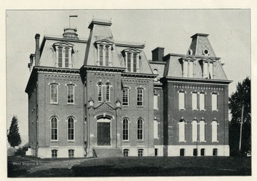 'Is a four-story building containing the Lecture Rooms and Library of the College of Law; the Lecture Rooms and Laboratories of the Departments of Zoology, Botany, and Bacteriology and Pathology; and the Lecture Rooms of the Departments of English, the Romance Languages, and the Germanic Languages.  University Hall contains thirty rooms.  The north wing has just been completed, and the south wing will be built in the near future.'