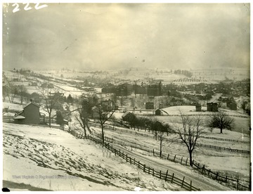 Inscription with the photograph: 'View from south's pasture showing the house owned by the White heirs on Sunnyside in the foreground, and campus before addition to Woodburn Hall, but after Science Hall was built.' 'View of University Ave? The WVU Campus, and Morgantown, taken from a point near the present intersection with Beverly Ave ca. 1895.'