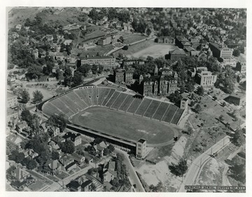 An aerial view of old Mountaineer Field.  Also viewable are Woodburn Hall, Martin Hall, Chitwood Hall, Oglebay Hall, and Stalnaker Hall.
