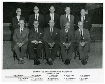 Standing: H.M. Cather (Mechanical), H.P. Simons (Chemical), L.Z. Seltzer (Aero-Space), H.W. Speiden (Civil), R.E. Shafer (Industrial); Seated: C.H. Cather (Mechanics), C.A. Arents (Dean, Engineering), W.A. Koehler (Director, Engineering Experimental Station), G.R. Spindler (Director, Mines), E.C. Jones (Electrial).'