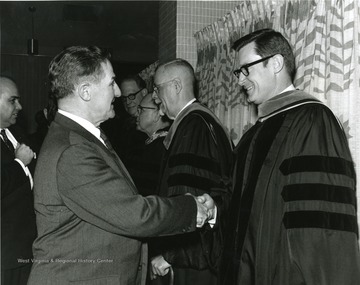 'A scene from the March, 7, 1967 Faculty Honors Convocation shows, from left to right: Robert Slonneger, WVU Professor of Mechanical Engineering; R.C. Butler, WVU, Professor and Chairman of Agricultural Engineering; George McLaren, WVU Professor of Agricultural Biochemistry and Nutrition; Clark Sleeth, Dean of the WVU School of Medicine; Virgil Lilly, WVU Professor of Physiology; and Wesley Bagby, WVU Professor of History. 100th Anniversary Office.'