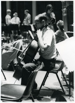 Professor William Vehse playing the cello.