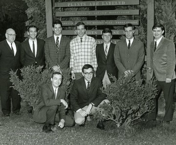 Kneeling: Left to right, Charlie Jacob, Ted Sentz; Standing, left to right, Dr. G.G. Pohlman (advisor), Leonard Tennant, Jack Smith, Tom Charles, Chuck Waggy, Gary Fogus, Bill McCoy.