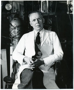 Dean Van Liere sitting in front of medical equipment.