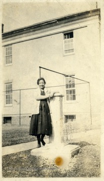 African-American student Ann Campbell of Charleston, W. Va. leaning against a pillar on the Storer College campus for a portrait.