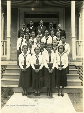 Group portrait of the Glee Club in uniform at Storer College, a school for African-Americans.