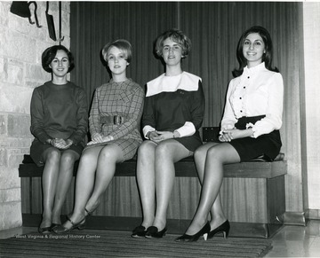 Panhellenic Executive Officers pose for a photo from left Mary Fowler of Alpha Phi (Treasury), Anna Ott of Gamma Phi Beta (Secretary), Nancy Davenport of Chi Omega (Vice President) and Carolyn Peluso of Kappa Delta (President).