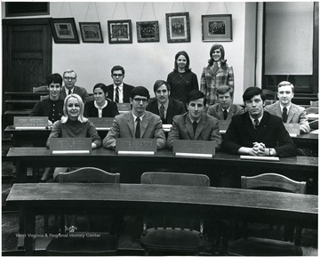 In the front row, left to right: Cheryl Backus, Graduate and Law; Wayne Armstrong, Engineering; Al Martine, Minority Leader.  Second row, visibly identified, left to right: Terry Hertznell, Arts and Sciences and Journalism; Terri Smith, Arts and Sciences and Journalism.