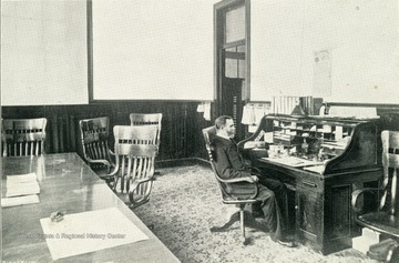 President Goodknight at his desk in his office.