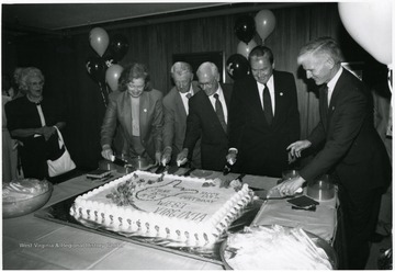 From left to right: Diane Reinhard, Harry Heflin, Paul Miller, Elvis J. Stahr, Neil S. Bucklew.