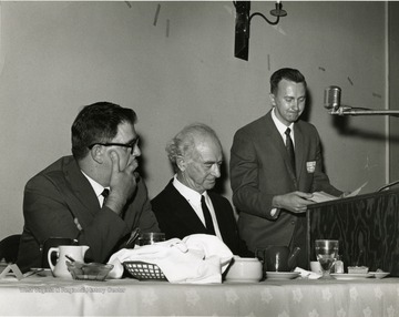 Pauling, Linus (center) attends at Science-Writing Symposium held at WVU.