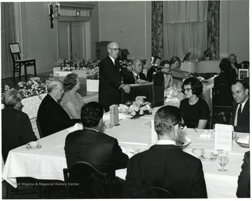 'Dr. Earl R. Boggs, WVU assistant to the President, introduces Dr. William C. Steere at Authors' Banquet of May 11, 1967.