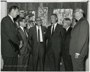'A scene from the Sept. 12, 1967 seminar, 'The State University,' shows, from left to right: Ruel Foster, WVU prof. and chairman of English and chairman of the seminar planning committee; Allan Ostar, executive director of the Association of State Colleges and Universities; Russell Thackrey, Russell, executive director of the National Association of State Universities and Land-Grant Colleges; David White, WVU director of Forestry and Prof. of Forestry Economics; Clark Sleeth, WVU Dean of Medicine; and Fred Harrington, President of the University of Wisconsin.