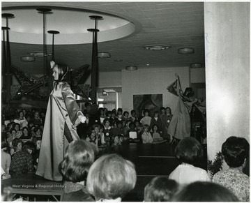 'Scene from the style show at the international meeting of the Association of Women Students, held Mar. 23-27, 1967 during the 100th Anniversary Observance.'