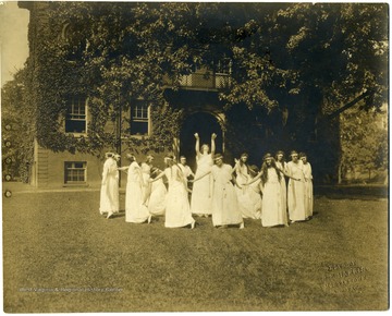 Female students of aesthetic dancing perform on Woodburn Circle, center: Mary Curran; Mildred Eastwood; Oney Dent.  Circle: Rachel Remsburg; Elsie Happel; Miss Rymer; Miss Lester; Mrs. Watson; Beulah Carson; Miss Cook; Emma Myers; Miss Lester; Miss Hereford; Gracia Remsburg and Bebby.