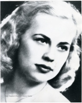 'Presenting Miss Mary Lou Bullard, Sophomore beauty from Wheeling, and MOONSHINE'S candidate for the All-American College Queen. Miss Bullard was chosen to represent West Virginia University in Paramount Pictures-Radio Guide's Contest to determine the prettiest and most talented co-ed in America, and out of the 256 entrants was chosen one of the State winners. From the forty-eight semi-finalists twelve were to be chosen by popular vote of Radio Guide's readers; and the final tally found West Virginia's Homecoming Queen amoung that number. Miss Bullard and the other finalists will be given a trip to the World Premiere of Paramount's college picture, Those Were the Days, at Knox College in Galesburg, Illinois, where one of the twelve will be chosen the All-American College Queen. The final winner will be given a trip to Hollywood, where she will be given a talent audition by Paramount Studios and see the Stars and the city. In addition to having been chosen West Virginia University's Homecoming Queen last Fall, Miss Bullard is a member of Li-Toon-Awa, an honorary member of Fi Batar Kappar, and belongs to Kappa Kappa Gamma sorority. When she left for Galesburg on May 21st the good wishes of the campus were with her. Vive la reine!'