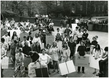 Women protesting for better lighting on campus after a series of rapes.