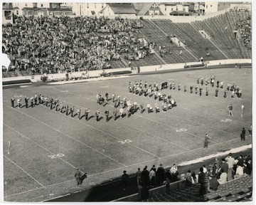 WVU marching band performs in formation.