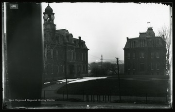 A view of Woodburn Circle--Martin Hall (left) and Woodburn Hall (right) from Agricultural Experiment Station.