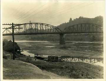 'Monongahela River below River Bridge at Morgantown, W.Va., 1930. Lock number 10 at the left of the picture. W. T. Snowden, P.O. Box 191, Mt. Morris, P.A.'