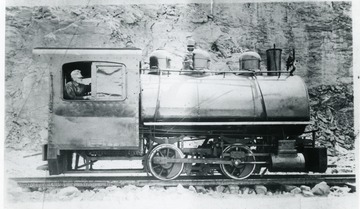 'Engineer, Robert S. Rigg and Porter 0-4-0, 24ton Locomotive #3 of Acme Limestone Co., Fort Spring, W. Va.. in 1930's.  Locomotive was purchased from Haley, Chisom &amp; Morris builders of the "New" Big Bend Tunnel on the C.&amp; O. where the locomotive was used.'