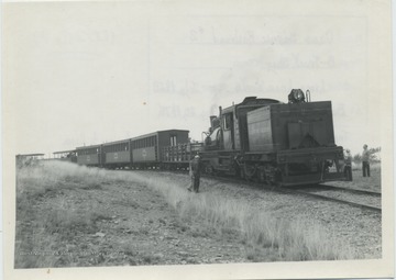Type: 3 Truck Shay; Builder: Lima Locomotive Works; Year: July 1828; At Bald Knob, W. Va. Train at top of mountain. Lunch stop before returning to Cass.