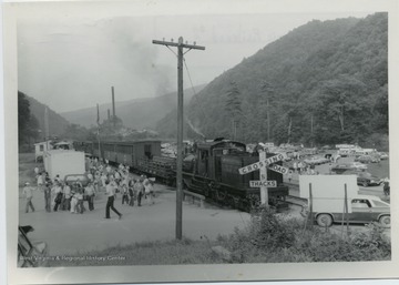 Type: 3 Truck Shay; Builder: Lima Locomotive Works; Year: July, 1928; Builder's No. 3733; Train has just arrived after coming down mountain from Bald Knob. 'Pacific Coast shay' came from British Columbia in 1970.
