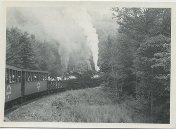 Type: 3 Truck Shay; Builder: Lima Locomotive Works; Year: 7/28, 12/22; Builder's No. 3373, 3189. At Old Spruce, W. Va. Train climbing to Bald Knob, taking water out of Spruce Creek at right.