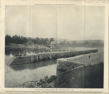 'U.S. Improvement, Great Kanawha River, West Virginia. General view of work from the top of the bank near the head of the lock. Work on the foundations for the weir part of the dam in progress inside of the cofferdam. (See views taken the same day inside the cofferdam.) The lock was completed except the gates, which were yet to be placed. The foundations for the navigation pass (being the part of the dam next to the lock) were finished in 1896.'
