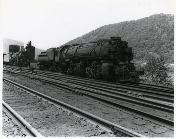 Image from the collection of the Chesapeake and Ohio Historical Society. 'CSPR-2372; Right 3/4 view of H-6, 2-6-6-2 Mallet #1485 at Handley, W. Va.; K-4 #2700 in background.'